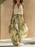 Alessandra - Chiffon Sleeveless Top with Ruffles and Lily Print Trousers