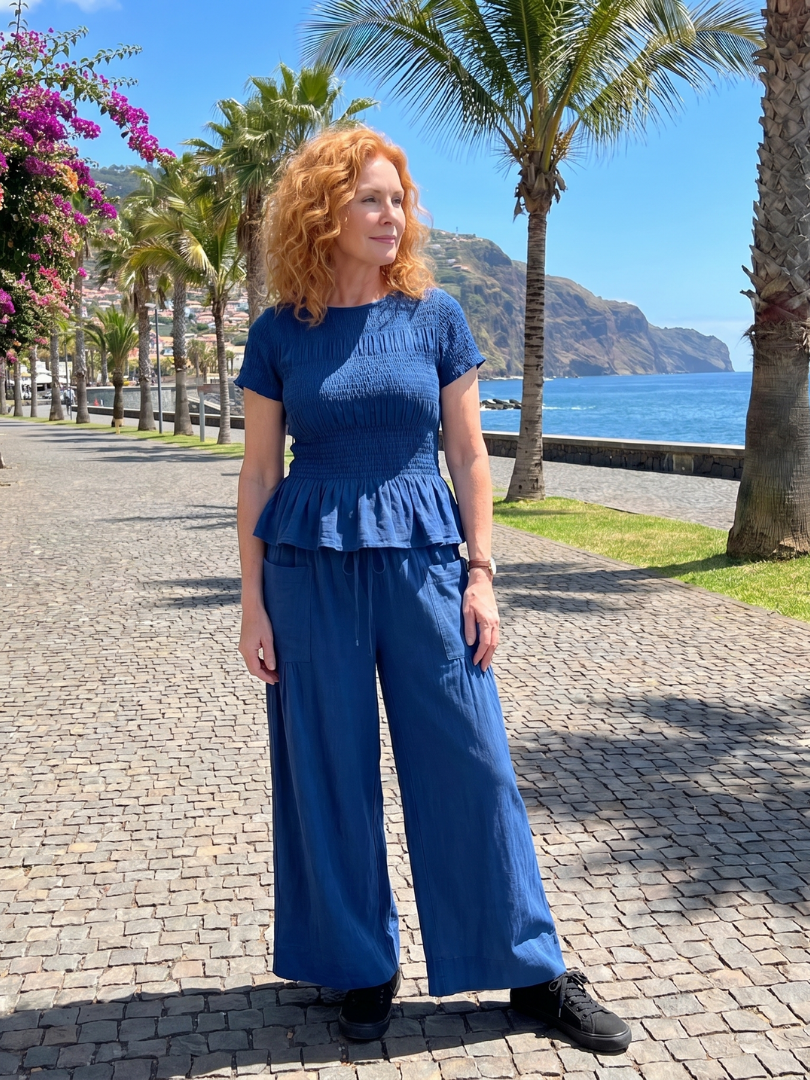 Eirenne | Peplum Detail Smocked Top And Wide Leg Trousers Set