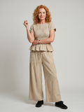 Eirenne | Peplum Detail Smocked Top And Wide Leg Trousers Set