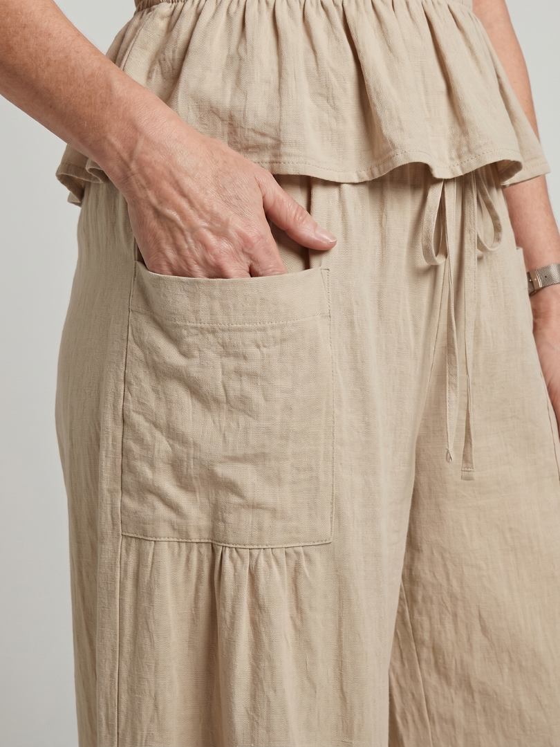 Eirenne | Peplum Detail Smocked Top And Wide Leg Trousers Set