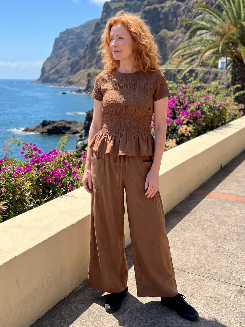 Eirenne | Peplum Detail Smocked Top And Wide Leg Trousers Set