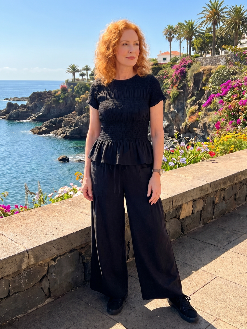 Eirenne | Peplum Detail Smocked Top And Wide Leg Trousers Set