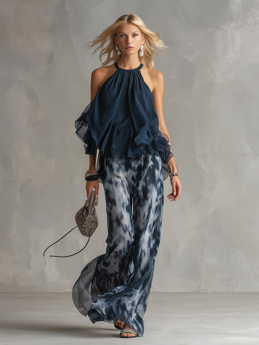Ludovica - elegant in chiffon with a high-neck top and wide printed trousers