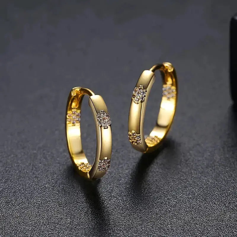 Vintage hoop earrings with golden flower