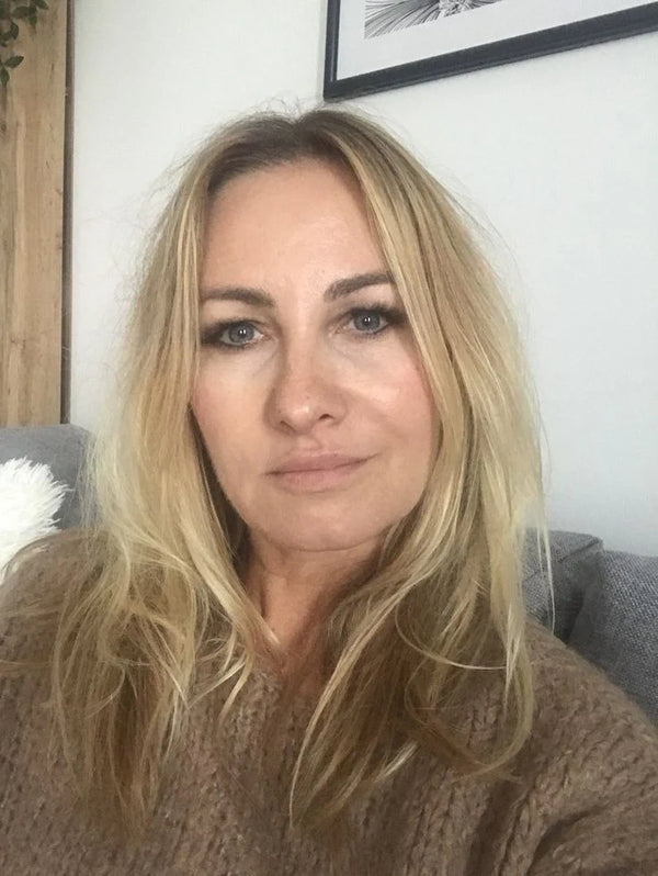 Angela M.
